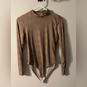 Mock neck cheetah print body suit